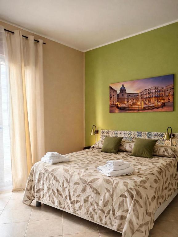Camera da letto matrimoniale di Victoria Apartment Palermo